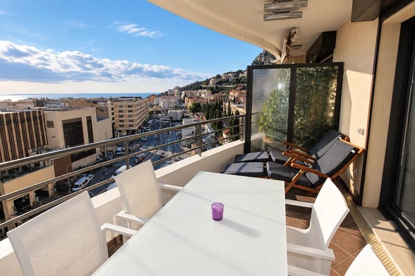 Appartement 2/3 pièces en étage élevé avec terrasse et parking