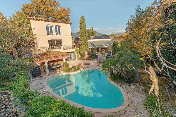 Property of Character in a Lush Green Setting